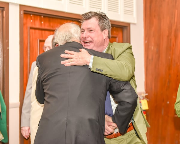 Savannah St. Patrick's Day Parade Grand Marshal Marty Hogan (right) hugs a well-wisher during the Grand Marshal's reception following his election in February. (Courtesy of Savannah St. Patrick's Day Parade Committee)