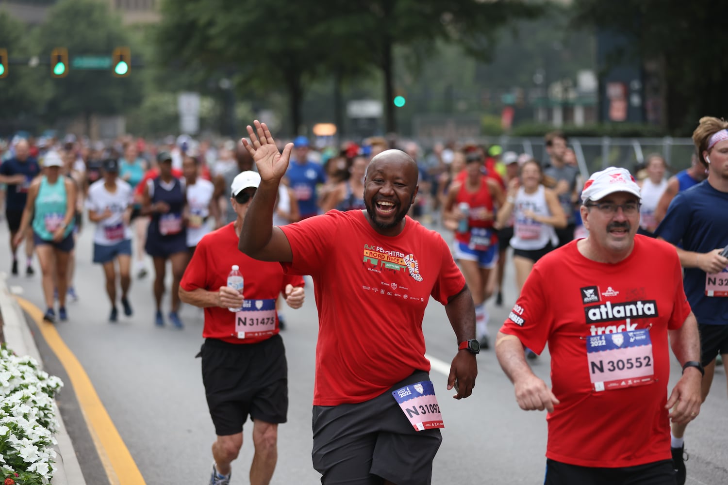 Runners in the 53rd running of the Atlanta Journal-Constitution Peachtree Road Race in Atlanta on Monday, July 4, 2022. (Jason Getz / Jason.Getz@ajc.com)