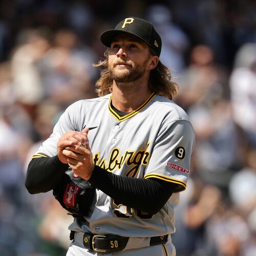 Pittsburgh Pirates pitcher Carmen Mlodzinski reacts after giving up a three-run home run to New York Yankees' Ben Rice in the seventh inning during the first baseball game of a doubleheader, Wednesday, July 22, 2026, in New York. (AP Photo/Adam Hunger)
