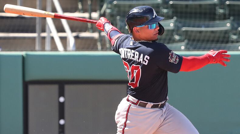 Atlanta Braves catcher William Contreras hits a two-run single to take give Atlanta a 4-1 lead over the Boston Red Sox in the third inning Monday, March 1, 2021, at JetBlue Park in Fort Myers, Fla. (Curtis Compton / Curtis.Compton@ajc.com)