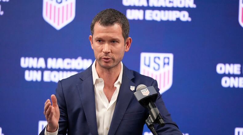 FILE - JT Batson, CEO of U.S. Soccer, speaks during a news conference, Sept. 16, 2023, in Atlanta. (AP Photo/Brynn Anderson, File)