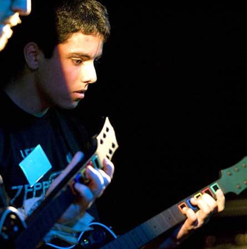 And the Guitar Hero III Champion of Atlanta is ...