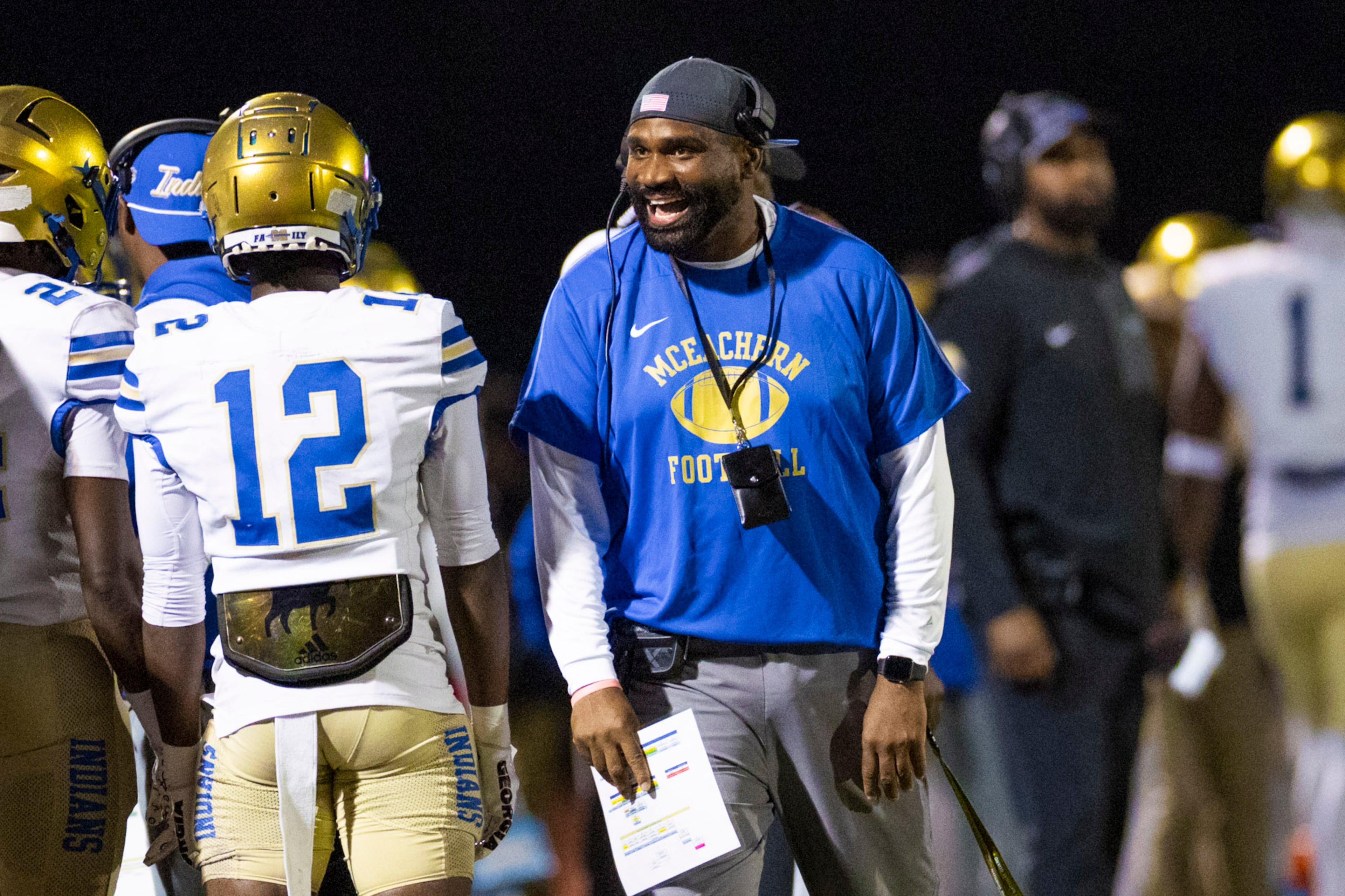 McEachern head coach Kareem Reid motivates his players against Hillgrove at Cobb Energy Hillgrove Stadium in Powder Springs, GA on Friday, October 17th, 2025. (Oscar Guevara Saenz for the AJC)