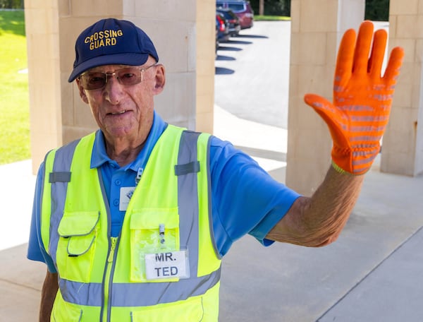 At 90 years old, Ted Masters still faithfully helps students get to school safely each day. 