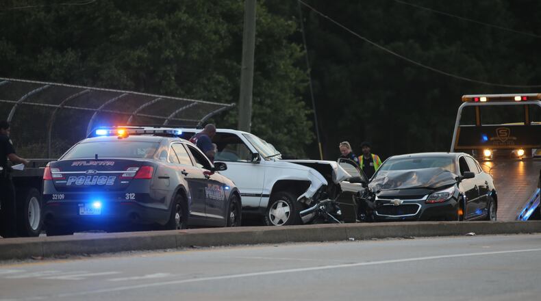 A police chase came to a violent end Friday evening when an allegedly stolen SUV crashed head-on into two vehicles, injuring a total of four people.