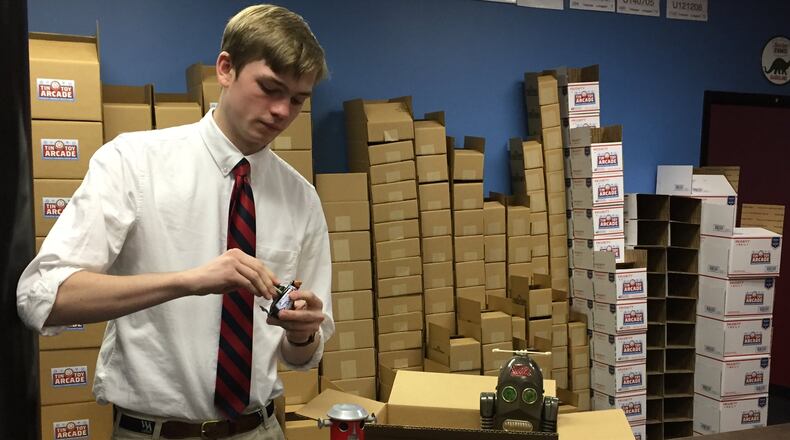 Aaron Brown, a senior at Woodward Academy, is the founder of Tin Toy Arcade, a successful online toy company. CONTRIBUTED