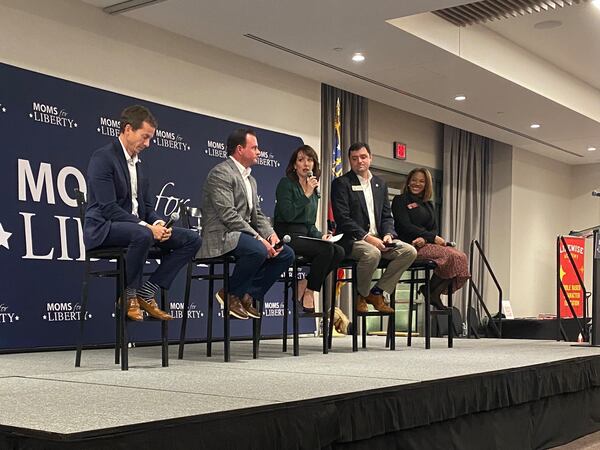 Georgia lawmakers Sen. Greg Dolezal, Sen. Clint Dixon, Rep. Scott Hilton and Rep. Mesha Mainor participated in a panel discussion led by Moms for Liberty founder Tina Descovich (center) on Nov. 13 at the Gas South Convention Center in Duluth.