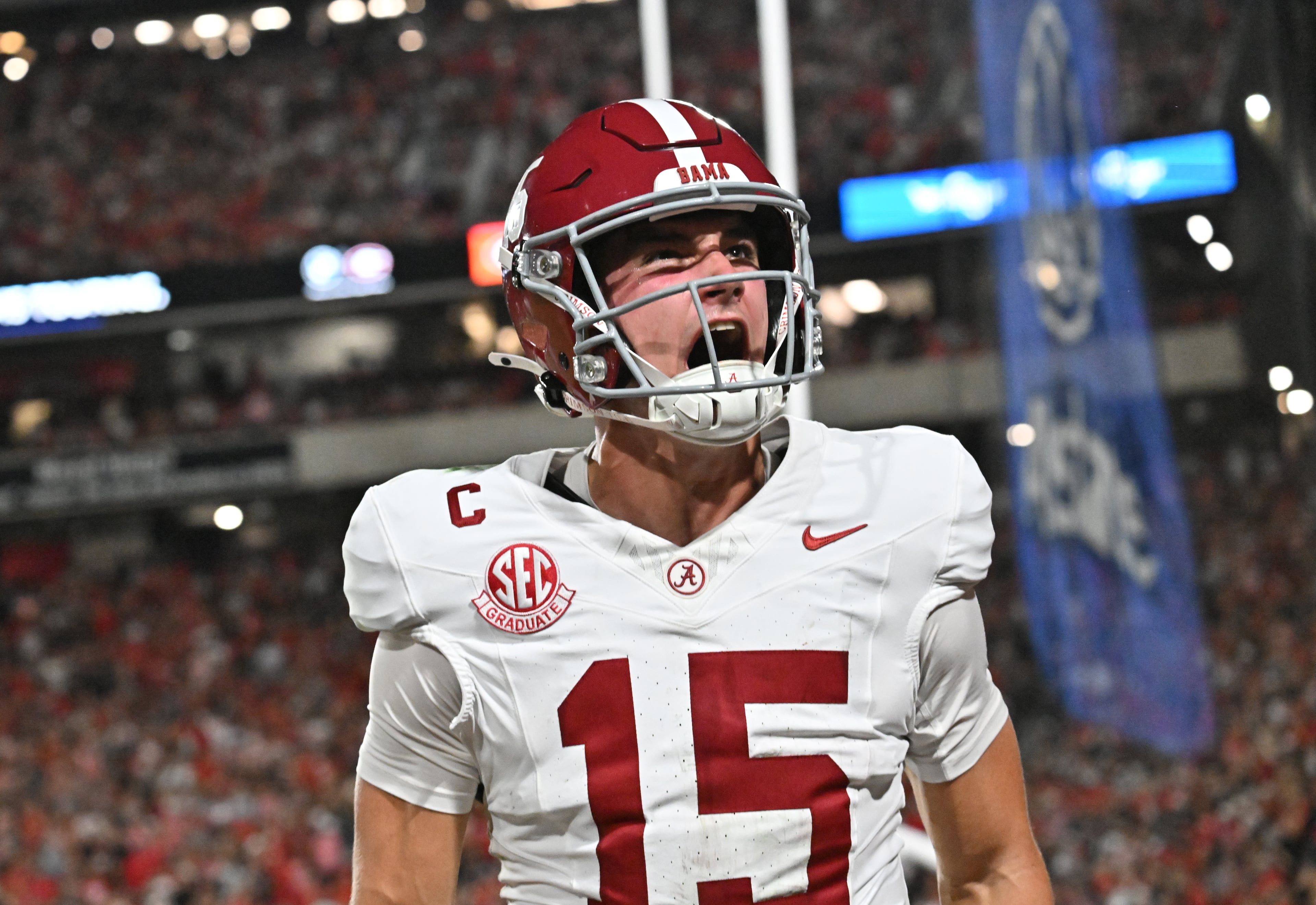 Alabama quarterback Ty Simpson (15) reacts after a touchdown by Alabama wide receiver Germie Bernard (5) during the first half in an NCAA football game at Sanford Stadium, Saturday, September 27, 2025, in Athens. (Hyosub Shin / AJC)