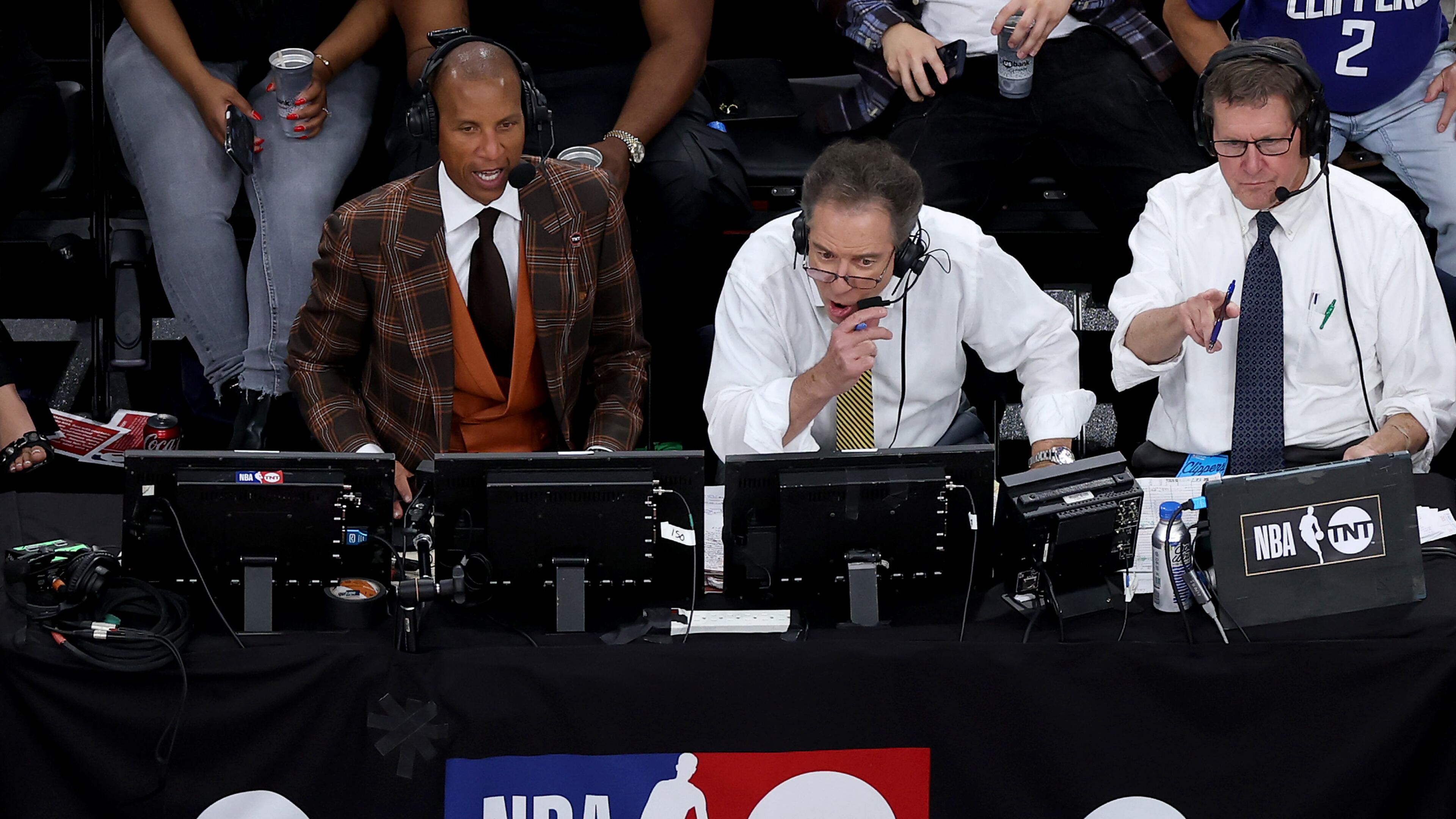 Kevin Harlan, center, and Reggie Miller, left, call the game for NBA on TNT with the Los Angeles Clippers and the Denver Nuggets in Game 4 of the Western Conference first-round NBA Playoffs at Intuit Dome on April 26, 2025, in Inglewood, California. (Luke Hales/Getty Images)