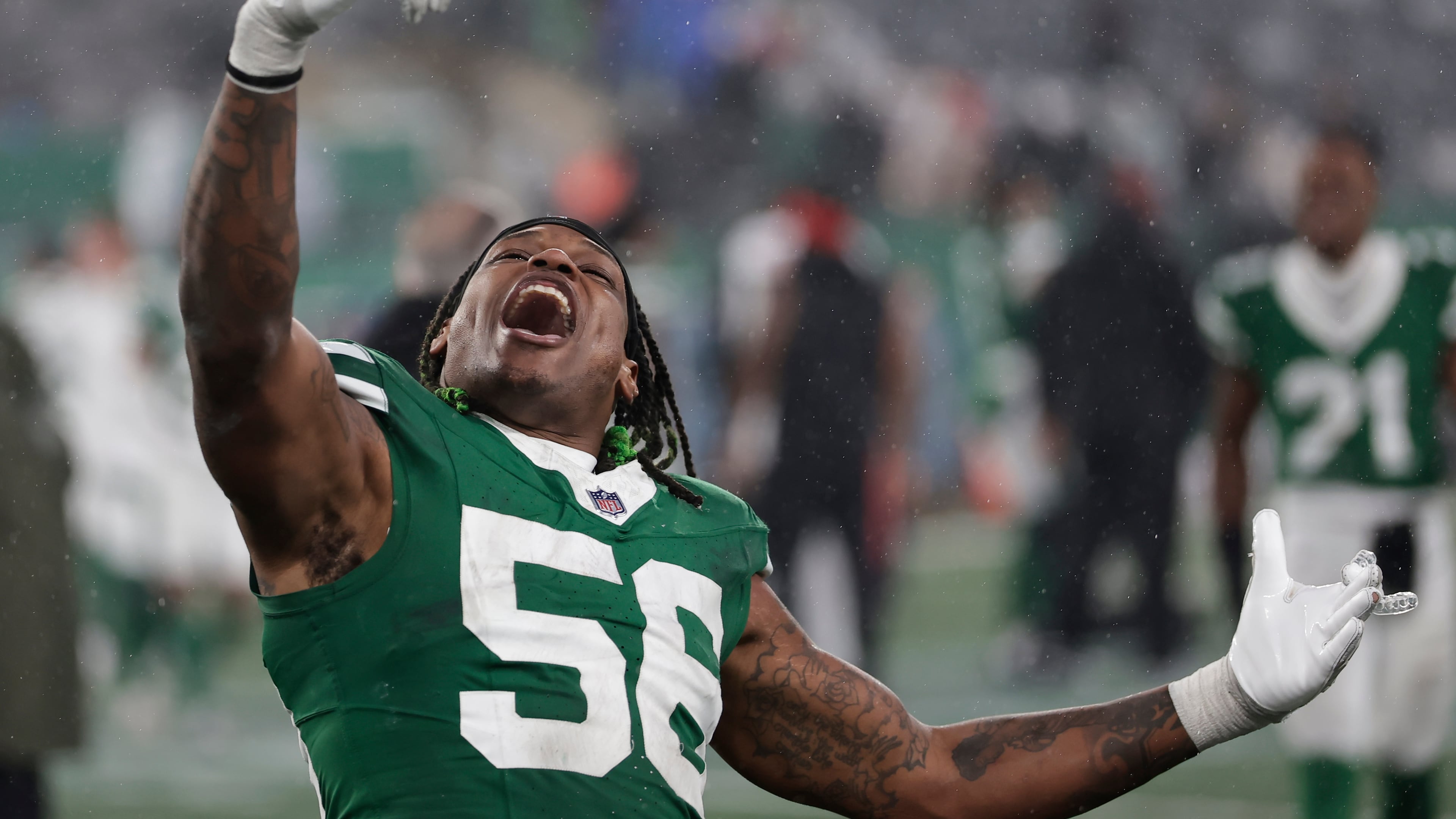 New York Jets linebacker Quincy Williams (56) celebrates victory over the Atlanta Falcons after an NFL football game, Sunday, Nov. 30, 2025, in East Rutherford, N.J. (AP Photo/Adam Hunger)
