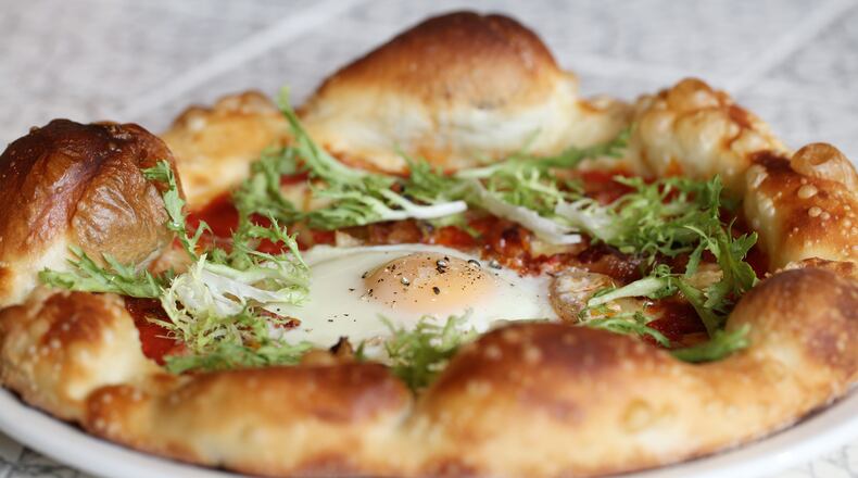 Spotted Trotter Guanciale and Farm Egg Pizza at Thirteen Pies. Credit: Sara Hanna Photography.