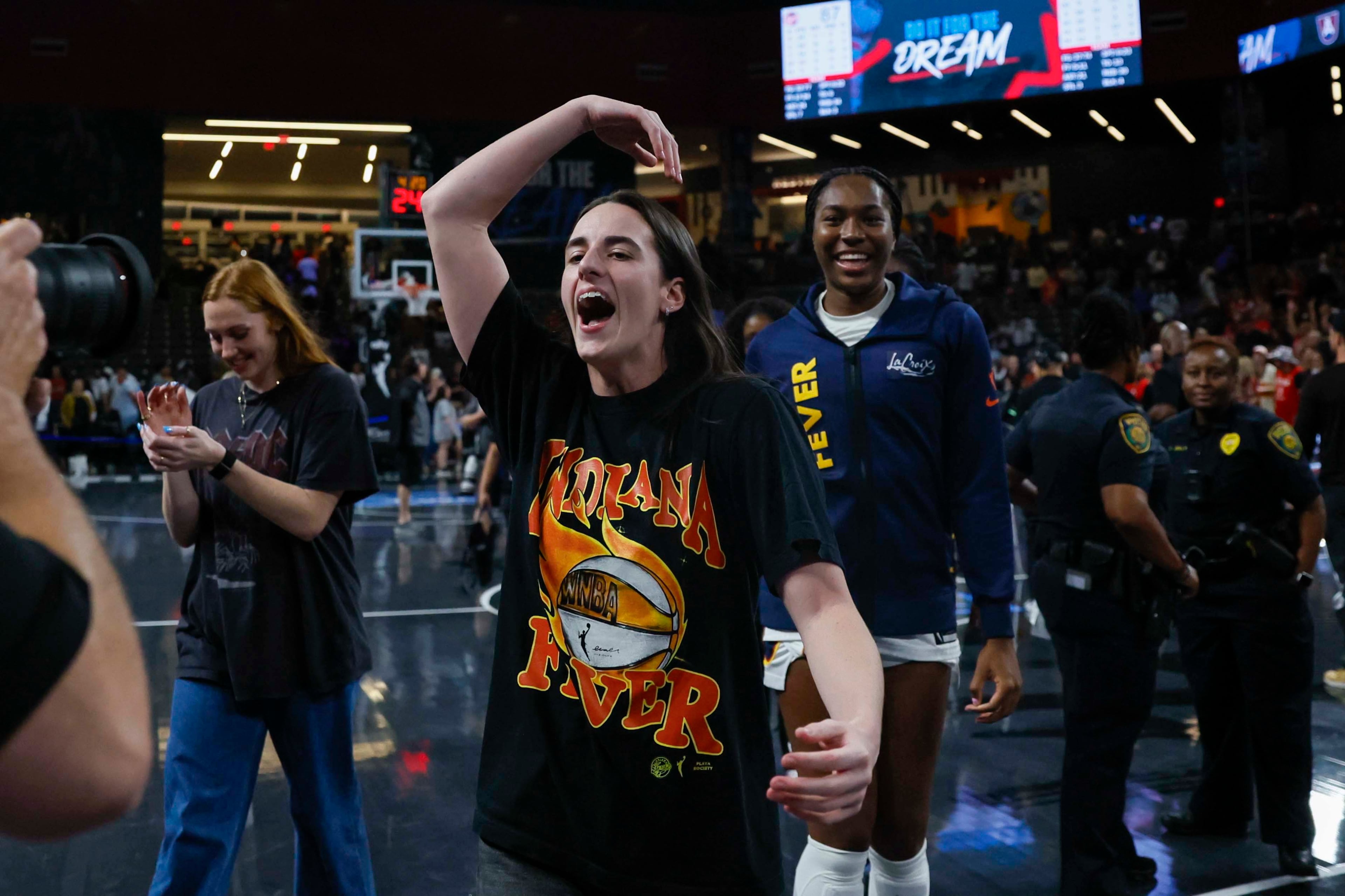 Indiana Fever guard Caitlin Clark reacts as she leaves the court after her team advances to the next round by defeating the Atlanta Dream 87-85 at Gateway Center Arena on Thursday, Sept. 18, 2024, in Atlanta. (Miguel Martinez/ AJC)