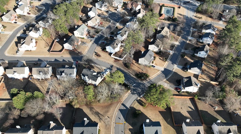 Aerial view of Winslow at Eagles Landing neighborhood, where large number of homes are owned by institutional investors, Thursday, Jan. 26, 2023, in McDonough. Local officials say their hands remain tied to enact the type of regulation that might protect renters from abusive practices and help hold accountable distant landlords who fail to keep up their properties. (Hyosub Shin / Hyosub.Shin@ajc.com)