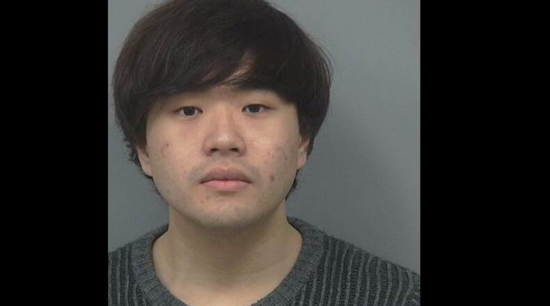 John Oh Kim, 23, has been charged with arson, burglary, aggravated assault and possession of tools for the commission of a crime.