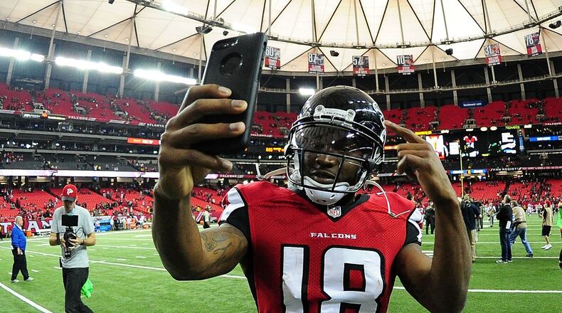 ATLANTA, GA - NOVEMBER 27: Taylor Gabriel #18 of the Atlanta Falcons celebrates after the game against the Arizona Cardinals at the Georgia Dome on November 27, 2016 in Atlanta, Georgia. (Photo by Scott Cunningham/Getty Images)