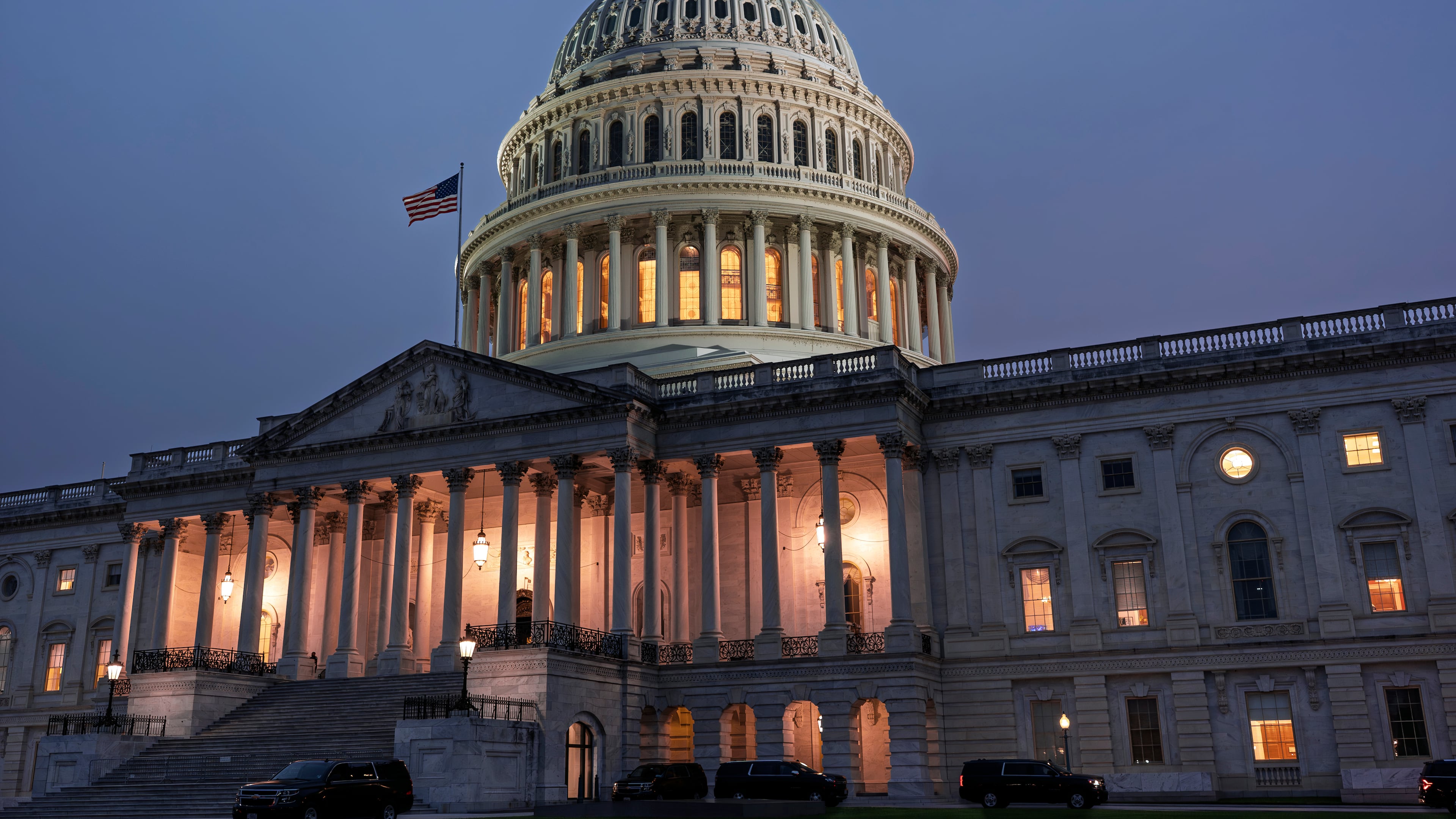 The Capitol is seen at dusk as Democrats and Republicans in Congress are angrily blaming each other and refusing to budge from their positions on funding the government, in Washington, Tuesday, Sept. 30, 2025. (AP Photo/J. Scott Applewhite)