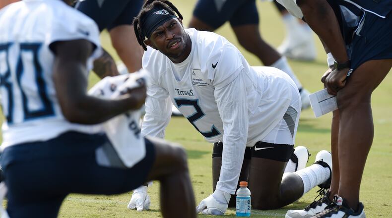 Tennessee Titans wide receiver Julio Jones (2) stretches a during training camp practice Saturday, July 31, 2021, in Nashville, Tenn. (Mark Zaleski/AP)