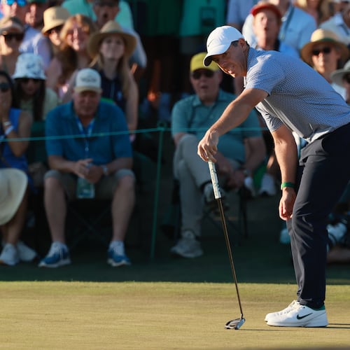 Rory McIlroy reacts after missing a putt on the 18th hole during the third round of the Masters at Augusta National Golf Club, Saturday, April 11, 2026, in Augusta, Ga. (Jason Getz/AJC)