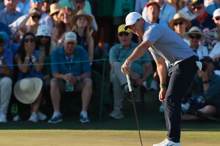 Rory McIlroy reacts after missing a putt on the 18th hole during the third round of the Masters at Augusta National Golf Club, Saturday, April 11, 2026, in Augusta, Ga. (Jason Getz/AJC)