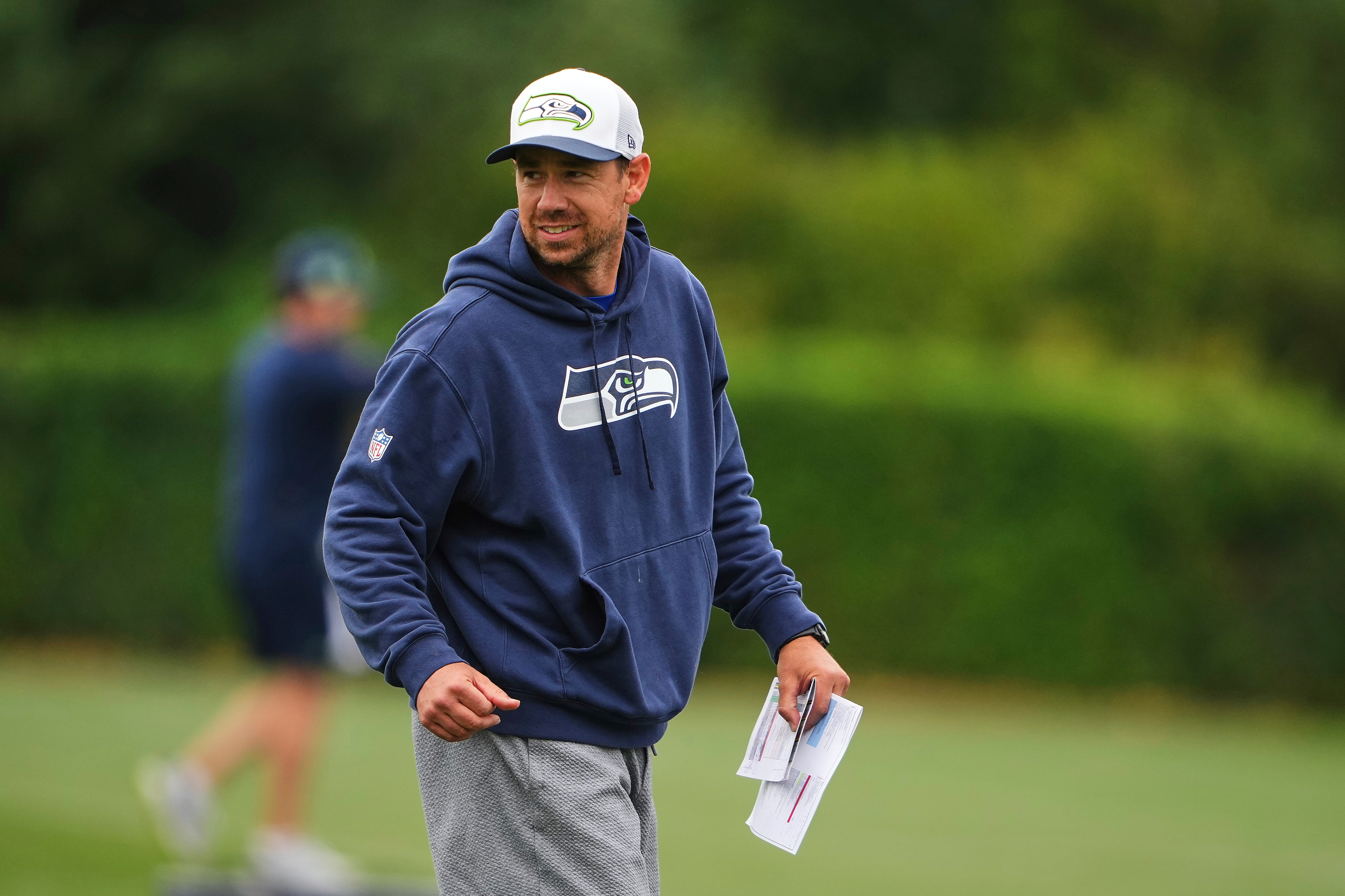 FILE - Seattle Seahawks offensive coordinator Klint Kubiak walks on the field during the NFL football team's training camp July 26, 2025, in Renton, Wash. (AP Photo/Lindsey Wasson, File)