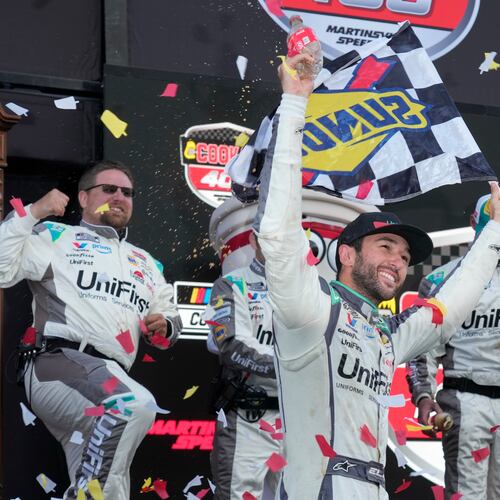 Chase Elliott celebrates in Victory Lane after winning a NASCAR Cup Series auto race in Martinsville, Va., Sunday, March 29, 2026. (AP Photo/Chuck Burton)