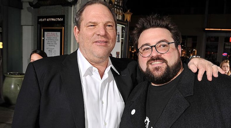 FILE PHOTO - Executive producer Harvey Weinstein and writer/director Kevin Smith arrive at a premiere held at Grauman's Chinese Theater on October 20, 2008 in Los Angeles, California.  (Photo by Kevin Winter/Getty Images)