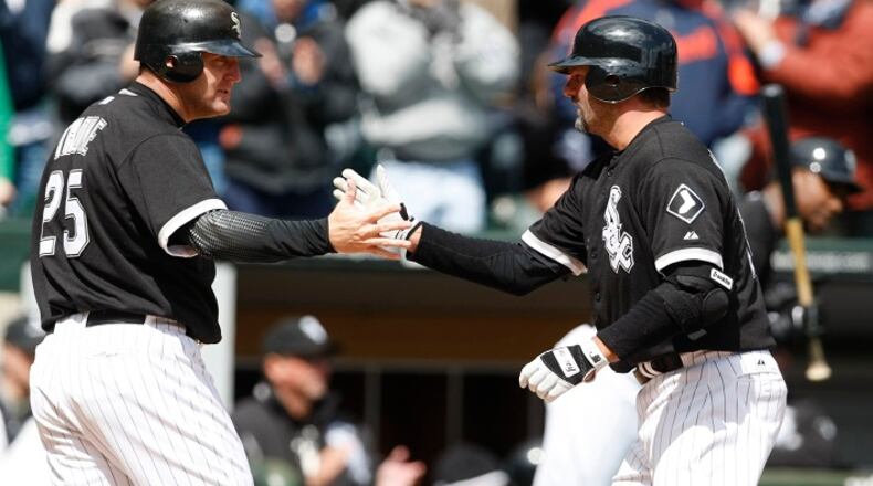 The Chicago White Sox's Jim Thome (25) greets teammate Paul Konerko after his grand slam against the Detroit Tigers at U.S. Cellular Field in Chicago on April 13, 2008. (Nuccio DiNuzzo/Chicago Tribune/TNS)