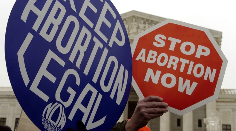 Anti-abortion marchers and some abortion-rights supporters at the U.S. Supreme Court on the anniversary of Roe v. Wade in January 2005. (Pete Souza/Chicago Tribune/TNS)