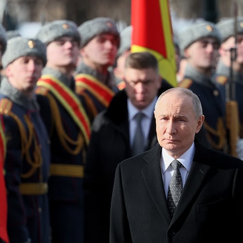 FILE - Russian President Vladimir Putin attends a wreath-laying ceremony at the Tomb of the Unknown Soldier near the Kremlin Wall during the national celebration of "Defender of the Fatherland Day" in Moscow, Russia, Feb. 23, 2026. (Maxim Shipenkov/Pool Photo via AP, File)