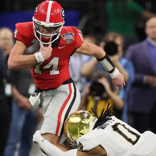 Georgia quarterback Gunner Stockton will have another chance at a Sugar Bowl win when the Bulldogs open CFP play in New Orleans on Jan. 1. Stockton and UGA lost to Notre Dame in the Sugar Bowl to end last season. (Jason Getz/AJC)