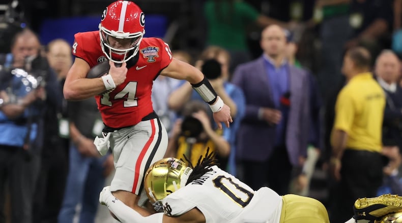 Georgia quarterback Gunner Stockton will have another chance at a Sugar Bowl win when the Bulldogs open CFP play in New Orleans on Jan. 1. Stockton and UGA lost to Notre Dame in the Sugar Bowl to end last season. (Jason Getz/AJC)