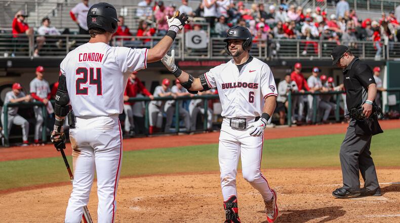 Georgia catcher/outfielder Corey Collins (6) is congratulated by teammate Charlie Condon after Collins hit a home run against Alabama on Sunday, March 24, 2024, at Foley Field in Athens. Collins hit six home runs for the Bulldogs in four games last week, while Condon had three in Saturday's doubleheader. (Kari Hodges/UGA Athletics)