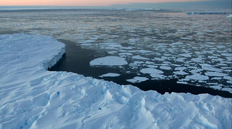 Giant tabular icebergs are surrounded by ice floe drift in Vincennes Bay on January 11, 2008 in the Australian Antarctic Territory. Australia's CSIRO's atmospheric research unit has found the world is warming faster than predicted by the United Nations' top climate change body, with harmful emissions exceeding worst-case estimates.