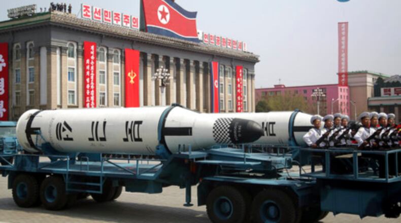 In this Saturday, April 15, 2017, file photo, a submarine missile is paraded across Kim Il Sung Square during a military parade in Pyongyang, North Korea to celebrate the 105th birth anniversary of Kim Il Sung, the country's late founder and grandfather of current ruler Kim Jong Un. North Korea's big day, the anniversary of the birth of its founding leader, Kim Il Sung, came and went with no underground nuclear test by the North, and no pre-emptive strikes off the deck of the USS Carl Vinson aircraft carrier sent to waters off the Korean Peninsula by President Donald Trump. Just hours before Vice President Mike Pence began his visit to Seoul on Sunday, Pyongyang fired off a ballistic missile â but it appears to have exploded seconds after it got off the ground. (AP Photo/Wong Maye-E, File)