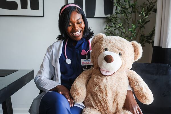 Alexina Santos, a Florida nurse and mother of three, said of Emari Etta-Tawo’s (pictured) budding social media channel: “Whatever she’s teaching, whatever she’s putting out, are things that I want my kids to learn and to hone in on. The fact that she is a woman of color is important too.” (Abbey Cutrer/AJC)