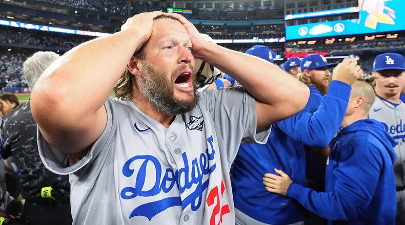 Los Angeles Dodgers pitcher Clayton Kershaw celebrates after the Dodgers defeated the Toronto Blue Jays in Game 7 of baseball's World Series, Sunday, Nov. 2, 2025, in Toronto. (Frank Gunn/The Canadian Press via AP)