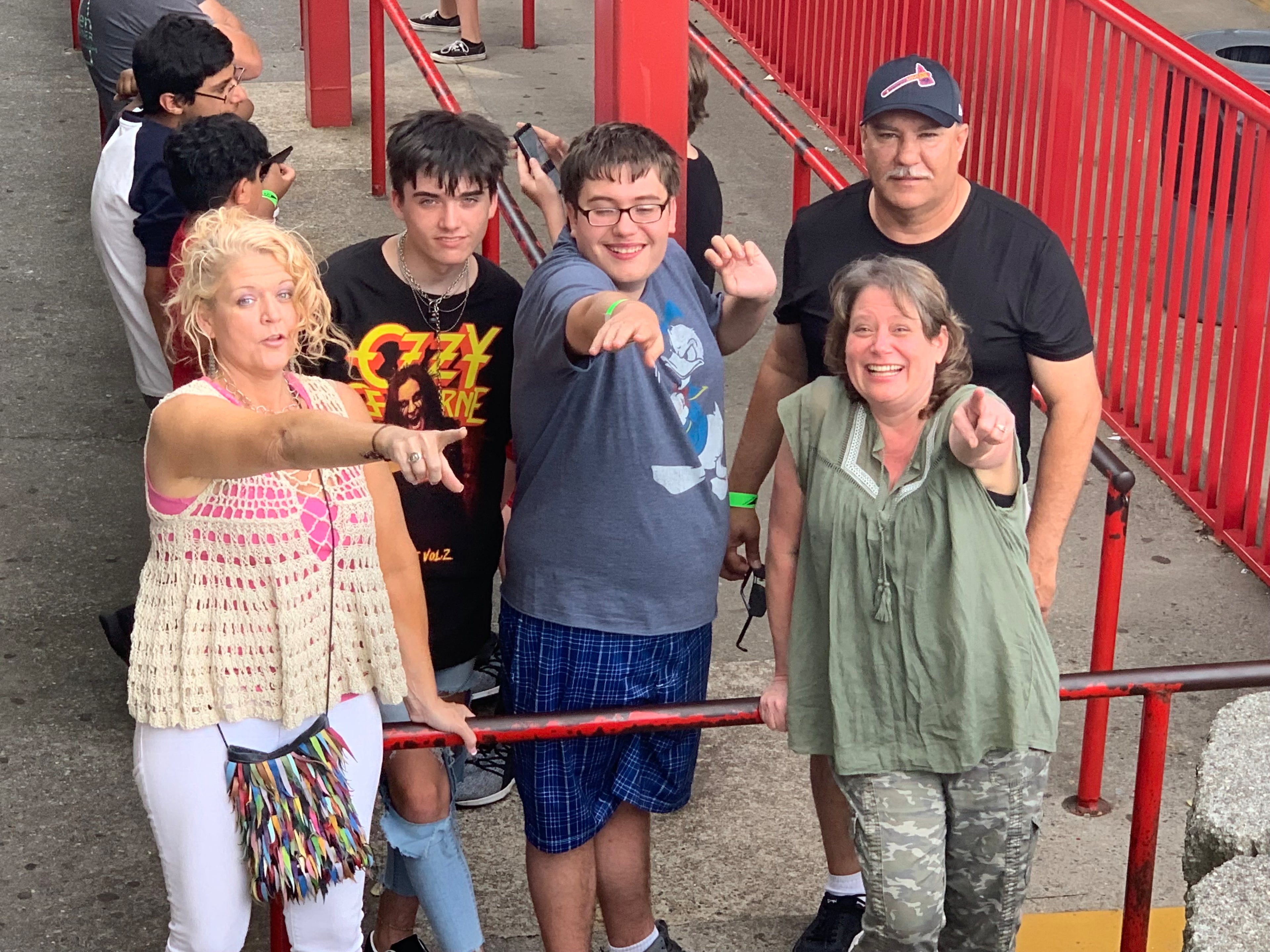 Angie Monday (front right) and her son Presley (center) have many memories visiting the Mountasia Marietta theme park with family. They are disappointed the place where Presley learned to drive a go-kart as a child is closing down. (Courtesy of Tonya Crowe)