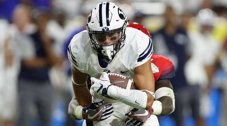 Wide receiver Colby Pearsonof the Brigham Young Cougars runs with the football after a reception against the Arizona Wildcats during the college football game at University of Phoenix Stadium on September 3, 2016 in Glendale, Arizona. Photo by Christian Petersen/Getty Images)