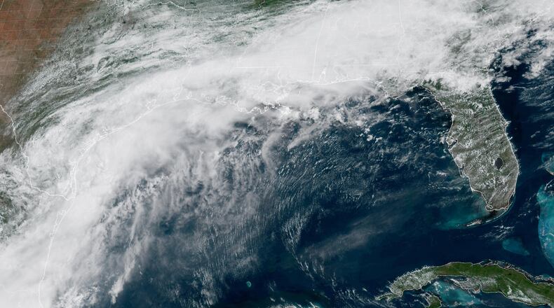 This GOES-19 GeoColor satellite image provided by NOAA, shows a storm system forming along the Gulf coast of Texas, on Tuesday, June 16, 2026. (NOAA via AP)