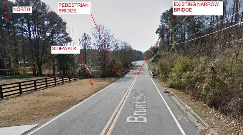 CMES Inc. will build the sidewalk and bridge, and Southeastern Engineering Inc. will inspect it.