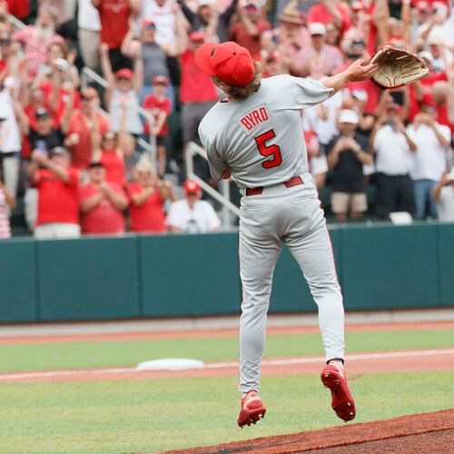 Georgia Bulldogs pitcher Justin Byrd tosses his glove to celebrate striking out the last Mississippi State batter during the 10th inning to secure the NCAA Super Regional victory Sunday, June 7, 2026. (Miguel Martinez/AJC)