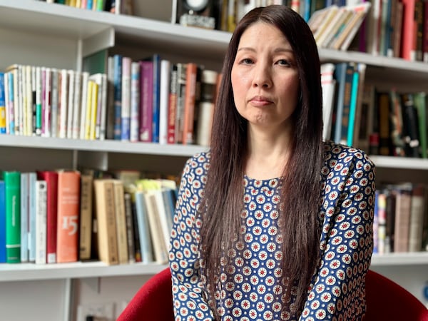 Sachi Schmidt-Hori, a Japanese literature and culture professor who was a consultant on the Assassin's Creed Shadows video game, poses for a portrait in her office at Dartmouth College in Hanover, New Hampshire, on April 2, 2025. (AP Photo/Holly Ramer)
