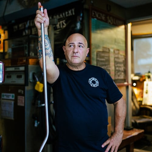 Firefighter Sal Argano, Ladder 10, poses for a portrait at FDNY "Ten House" near Ground Zero on Friday, Aug. 7, 2026, in New York. (AP Photo/Angelina Katsanis)