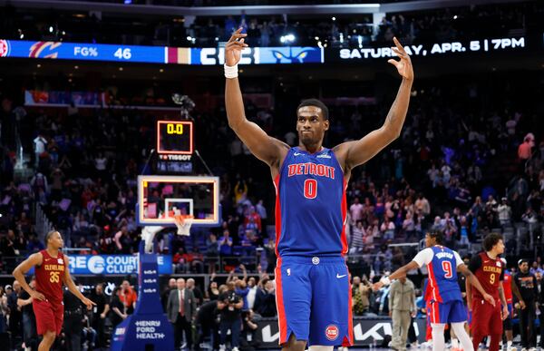 Detroit Pistons center Jalen Duren (0) celebrates after a win over the Cleveland Cavaliers in an NBA basketball game Friday, March 28, 2025, in Detroit. (AP Photo/Duane Burleson)