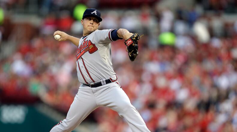 Atlanta Braves starting pitcher Kris Medlen throws during the first inning of a baseball game against the St. Louis Cardinals, Friday, Aug. 23, 2013, in St. Louis. (AP Photo/Jeff Roberson)
