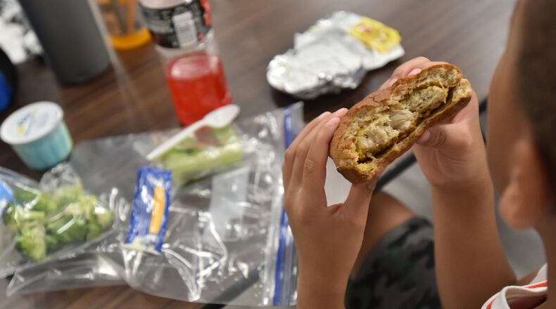 Children in DeKalb can get free breakfast and lunch at school sites through July 22. (HYOSUB SHIN / HSHIN@AJC.COM)