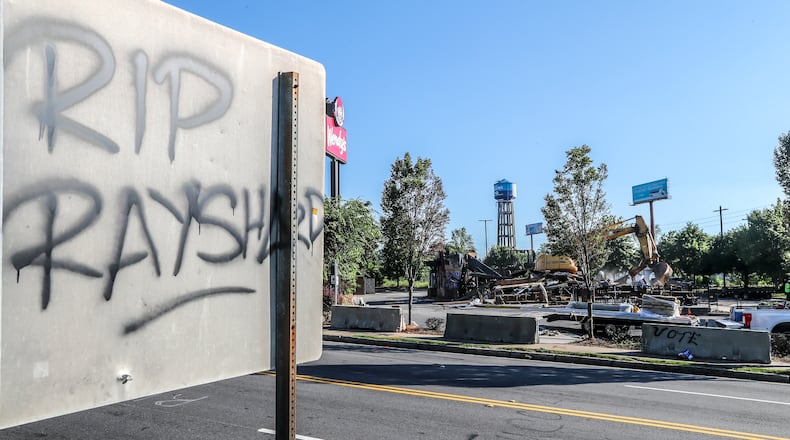 July 14, 2020 Atlanta: The Wendy’s where Rayshard Brooks was killed by Atlanta police last month was torn down on Tuesday, July 14, 2020. Construction crews used an excavator to demolish the charred remains of the University Avenue restaurant. It is not clear who ordered Tuesday’s demolition, which comes a little more than a week after demonstrators who had camped out at the site following Brooks’ death were forced off the property.  The Wendy’s became ground zero for protests after Brooks was shot in the parking lot following an attempted DUI arrest in the drive-thru line June 12. The restaurant was set on fire the following day during one of those demonstrations. Garrett Rolfe, the officer who fired the deadly shots, was charged with murder and fired from the department. He is free on $500,000 bond. For weeks, protesters remained at the torched restaurant and refused to leave until demands for police reform and a memorial to Brooks’ memory were met. That changed when city leaders sent officers to clear the site July 6 in response to the killing of 8-year-old Secoriea Turner, who was shot across the street from the Wendy’s during a violent July 4 weekend in Atlanta. JOHN SPINK/JSPINK@AJC.COM