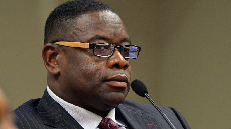 STATE'S STAR WITNESS--JUNE 10, 2015 DECATUR Former DeKalb County purchasing director Kelvin Walton continues his testimony under an often testy cross examination Wednesday. Witness testimony continues Wednesday in the retrial of embattled DeKalb County CEO Burrell Ellis on corruption charges before DeKalb County Superior Court Judge Courtney L Johnson Wednesday, June 10, 2015. KENT D. JOHNSON /KDJOHNSON@AJC.COM