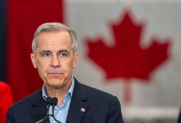 Canada Liberal Leader Mark Carney pauses while speaking at the airport in Gander, Newfoundland, on Monday March 24, 2025. (Frank Gunn/The Canadian Press via AP)
