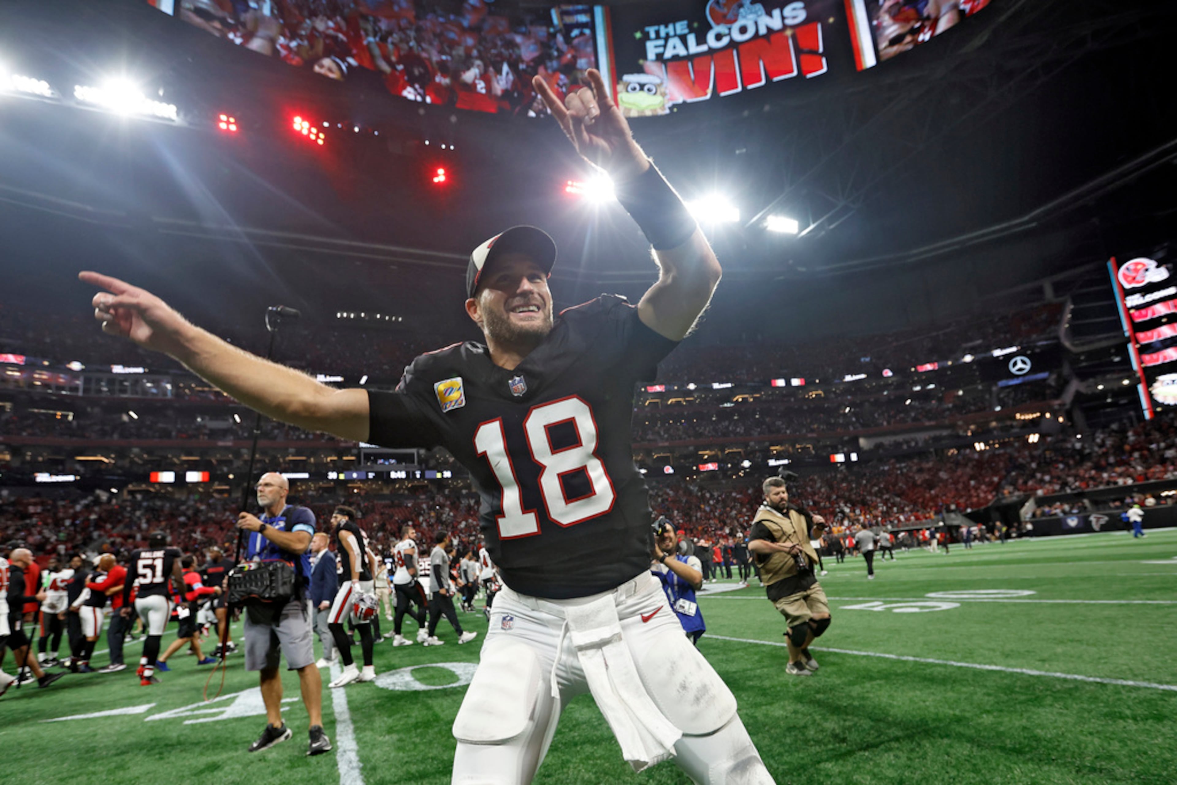 Falcons quarterback Kirk Cousins celebrates after beating Tampa Bay in 2024.